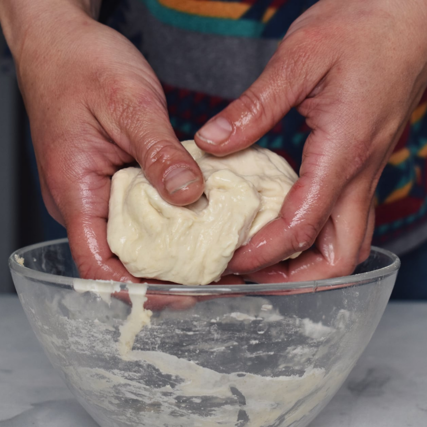 hands working with dough